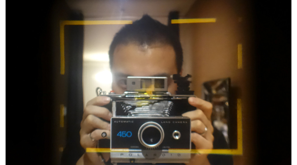 Viewing through Polaroid Land 250 camera.